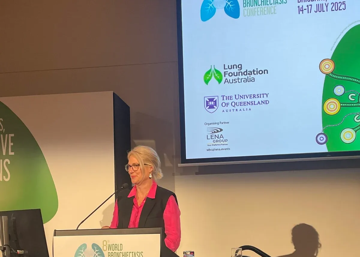Caroline presenting at a conference